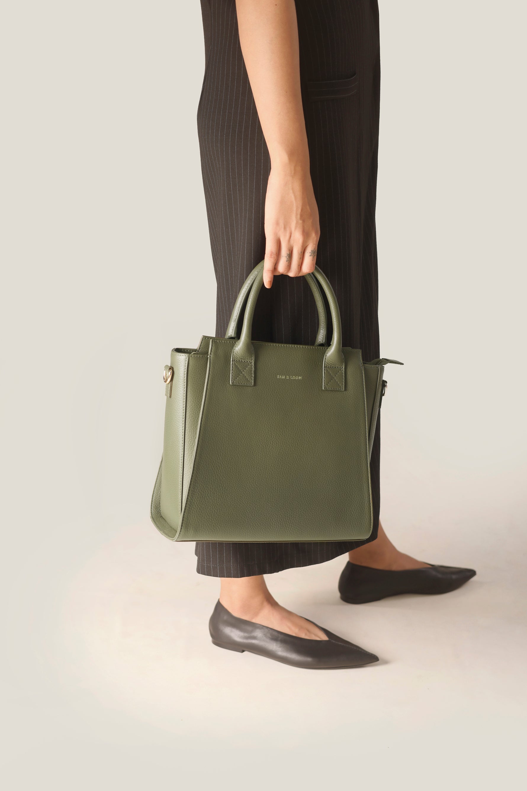 Olive green store leather handbag